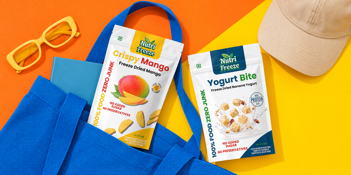 Nutri Freeze mango and yogurt pouches with a blue travel tote on orange and yellow